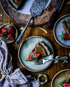 cake with strawberry on saucer thumbnail