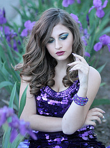 woman wearing purple sequin dress and bracelet thumbnail