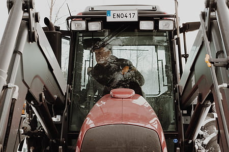 man riding inside heavy equipment thumbnail