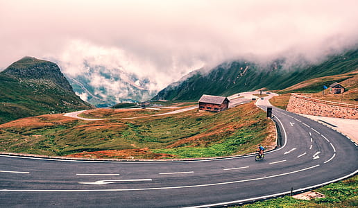 Man Riding Bike On Road thumbnail