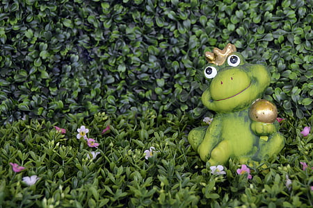 green frog figurine on green leaf plant thumbnail