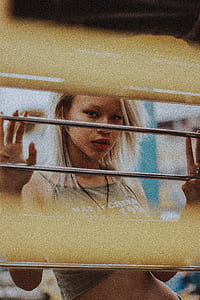 woman in brown spaghetti strap top posing for picture thumbnail