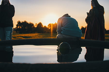 silhouette of man and woman under sunlight thumbnail