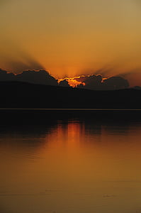 calm body of water at golden hour thumbnail