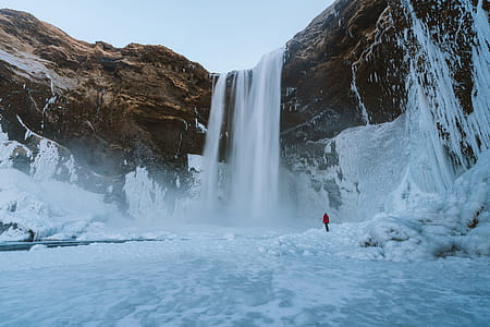 Person Walking on Snowfield thumbnail