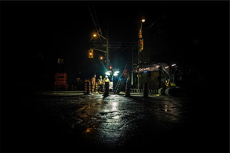 group of people road works during nighttime thumbnail