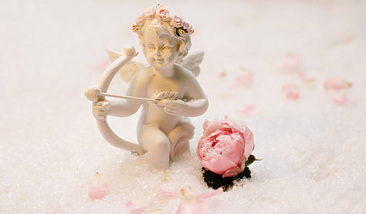 cupid beside rose bud thumbnail