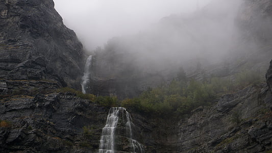waterfalls covered in mists during daytime thumbnail