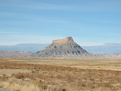 gray mountain hill under clear blue sky thumbnail