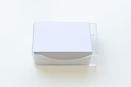 clear plastic paper case filled with white papers thumbnail