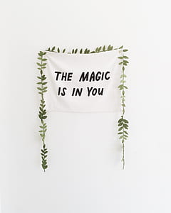 white the magic is in you-printed textile on wall thumbnail