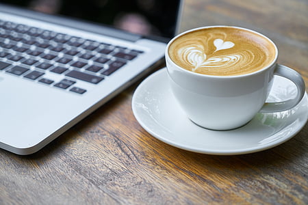 white ceramic teacup with espresso art thumbnail
