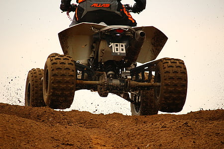 person driving ATV thumbnail