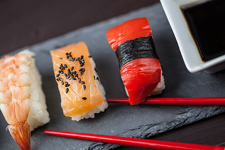 Fresh sushi pieces served on a slate thumbnail