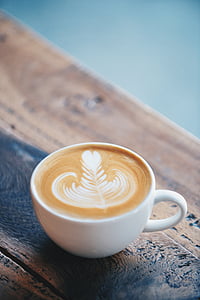 cup of coffee on wooden table thumbnail