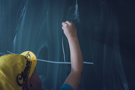 man in yellow cap holding chalk thumbnail