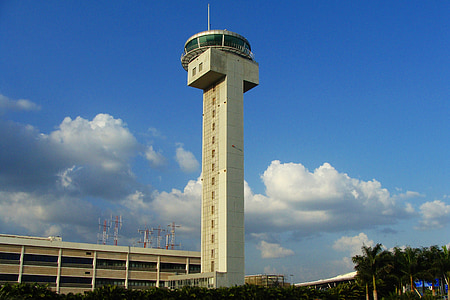 white high-rise building under clear blue sky thumbnail