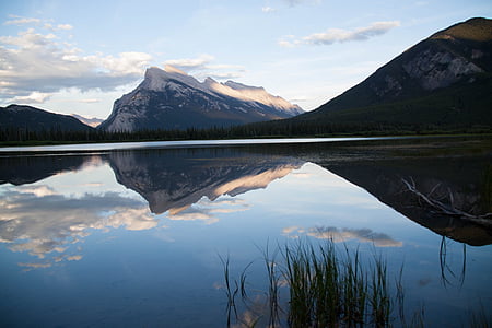 mountain peak near body of water thumbnail