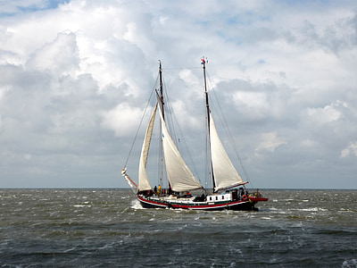 fishing boat on body of water thumbnail