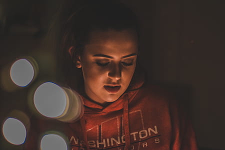 woman wearing red pullover hoodie thumbnail