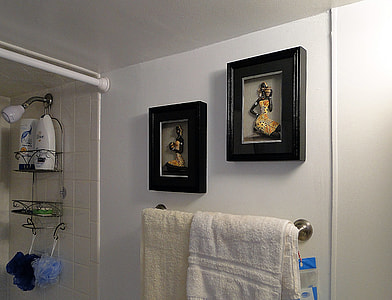 two black wooden framed woman-themed shadowboxes thumbnail