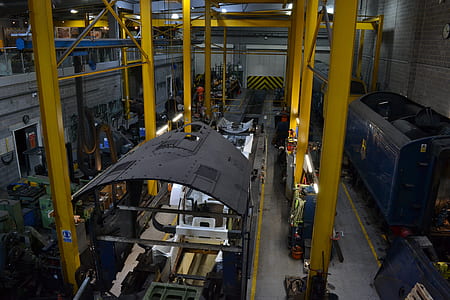 gray and white machine inside factory thumbnail