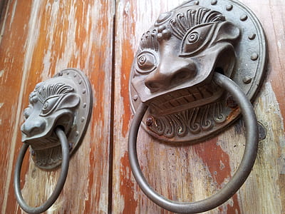 two black metal door knockers thumbnail