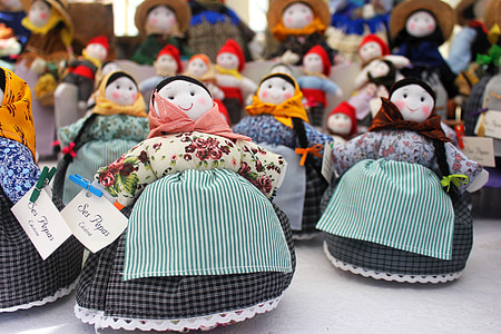 female doll display on table thumbnail