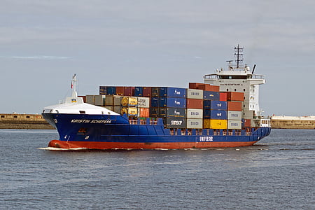red and red cargo ship on body of water thumbnail