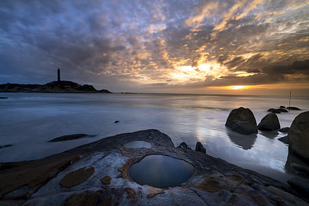 calm water under golden hour thumbnail