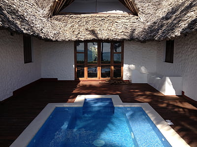 empty pool near door in room thumbnail
