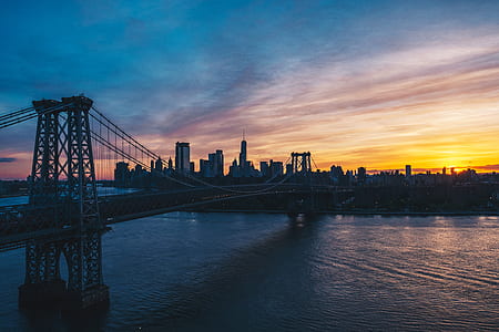 architectural photography of bridge above body of water thumbnail
