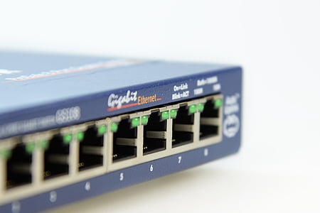 selective focus photography of blue Gigabit Ethernet network switch thumbnail