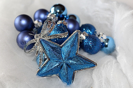 blue star and blue beads on white cushion thumbnail