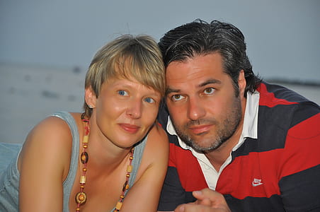 man and woman pose for a picture thumbnail