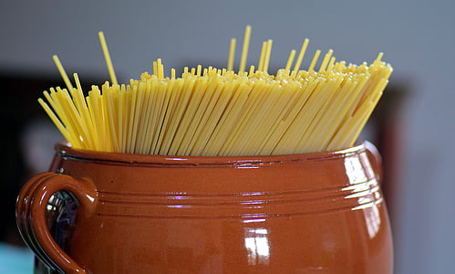 pasta on round brown ceramic bowl thumbnail