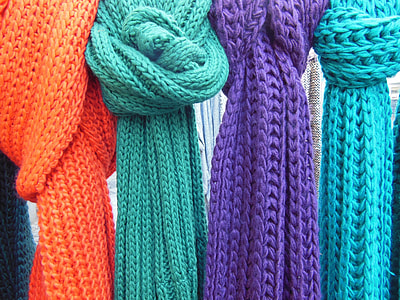 close-up photo of four knitted scarves thumbnail