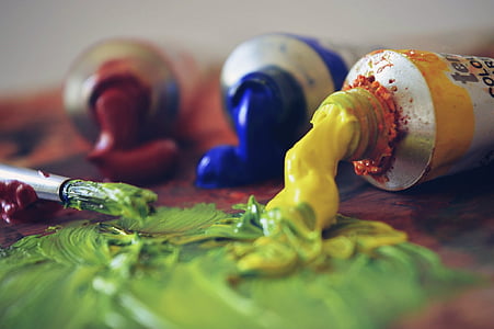 selective focus photography of paintbrush and paint soft-tubes thumbnail