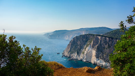 body of water near mountain thumbnail