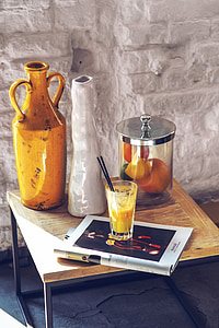 two brown and white vases on top of brown table thumbnail