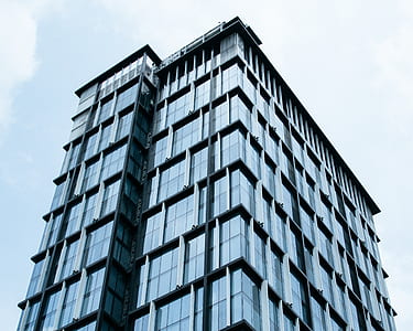 Curtain Glass Building Under Blue Sky thumbnail