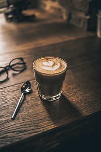 latte coffee on clear drinking glass thumbnail