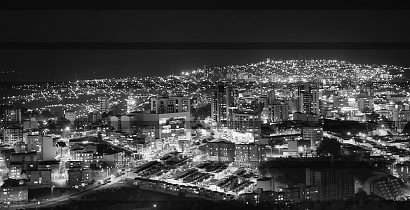 grayscale aerial photography of city skyline during nighttime thumbnail