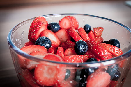sliced strawberries in bowl thumbnail