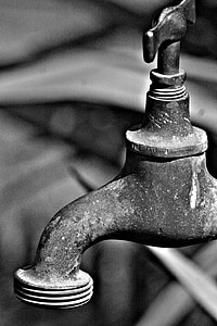 grayscale photography of turned-off spigot thumbnail