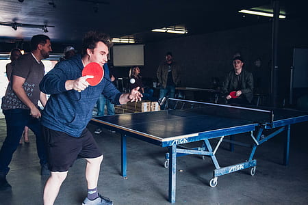 men playing ping pong thumbnail
