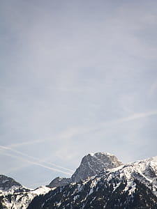 brown and black mountain with snowfield thumbnail