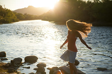 woman wearing red sleeveless dress thumbnail