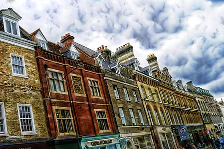 yellow and red concrete buildings thumbnail