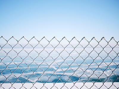 link fence under calming sky thumbnail